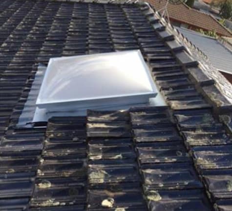 Skylight on dark tile roof Melbourne