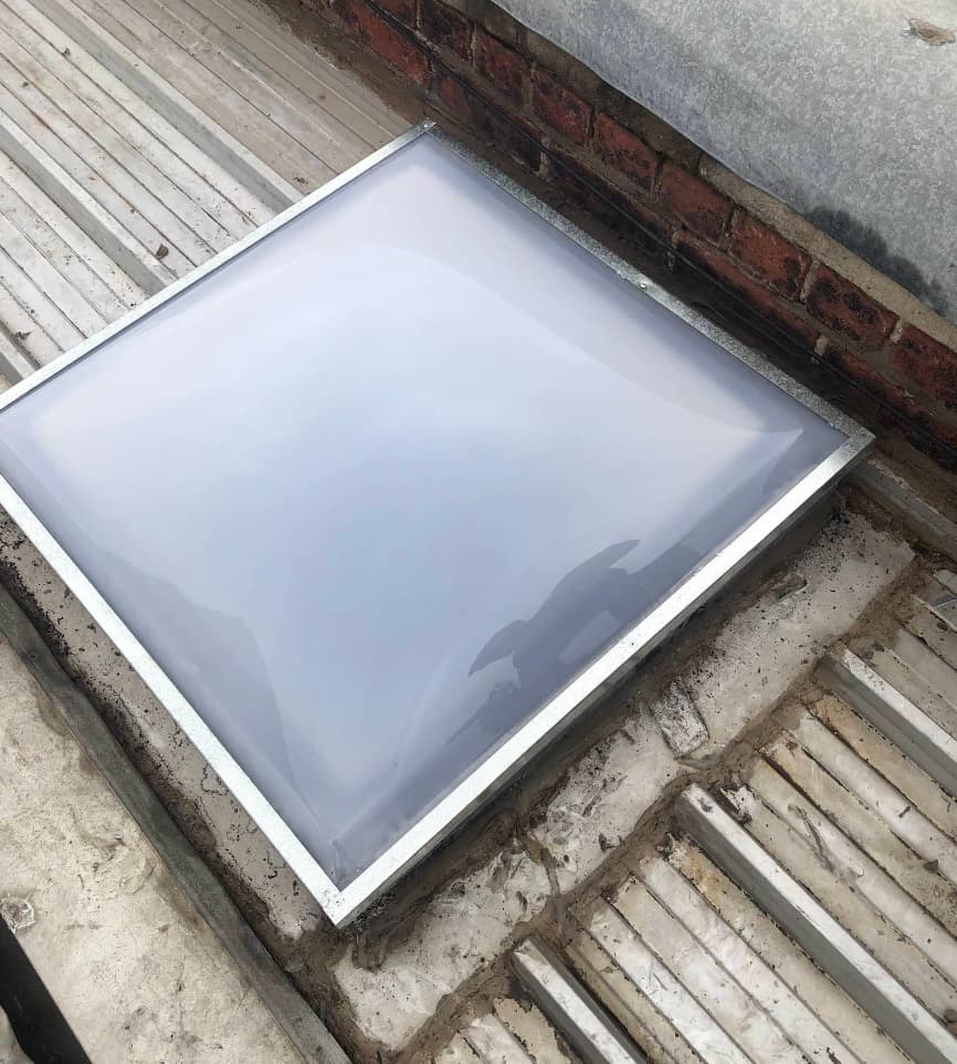 New skylight panel on flat roof