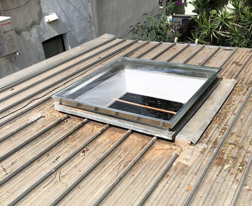 Skylight assembly on corrugated iron roof
