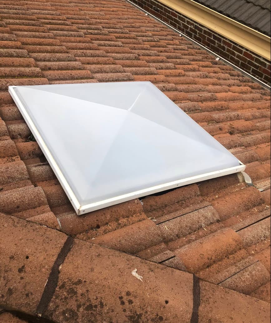 Skylight on terracotta tile roof