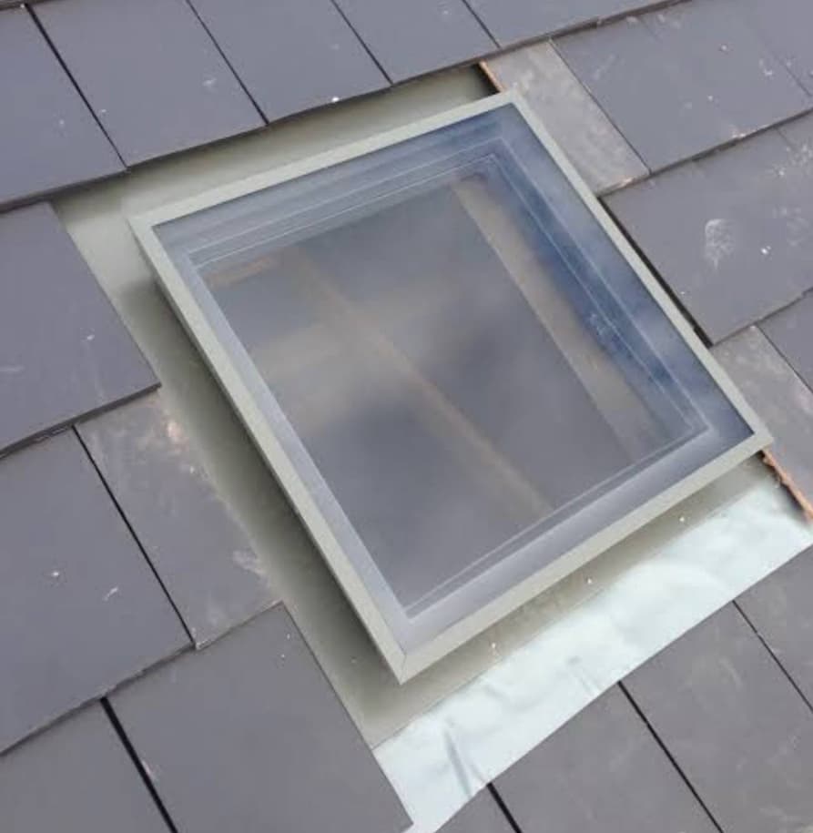Completed skylight on slate tile roof